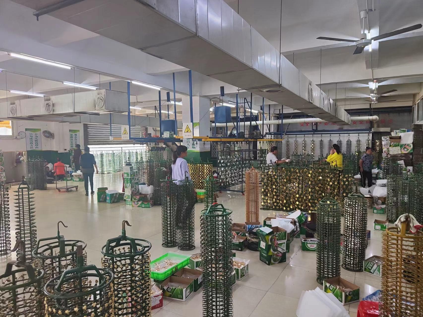 Production floor overview with workshop machinery and material racks